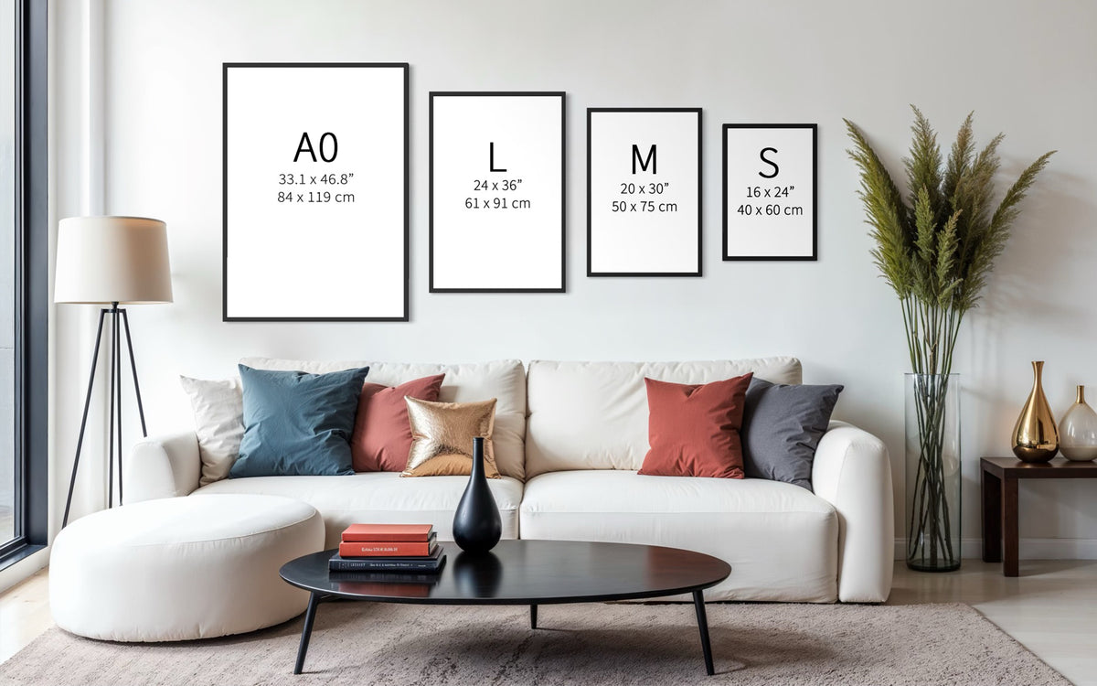 Modern living room with a white sofa, decorative pillows, and framed fine art on the wall.