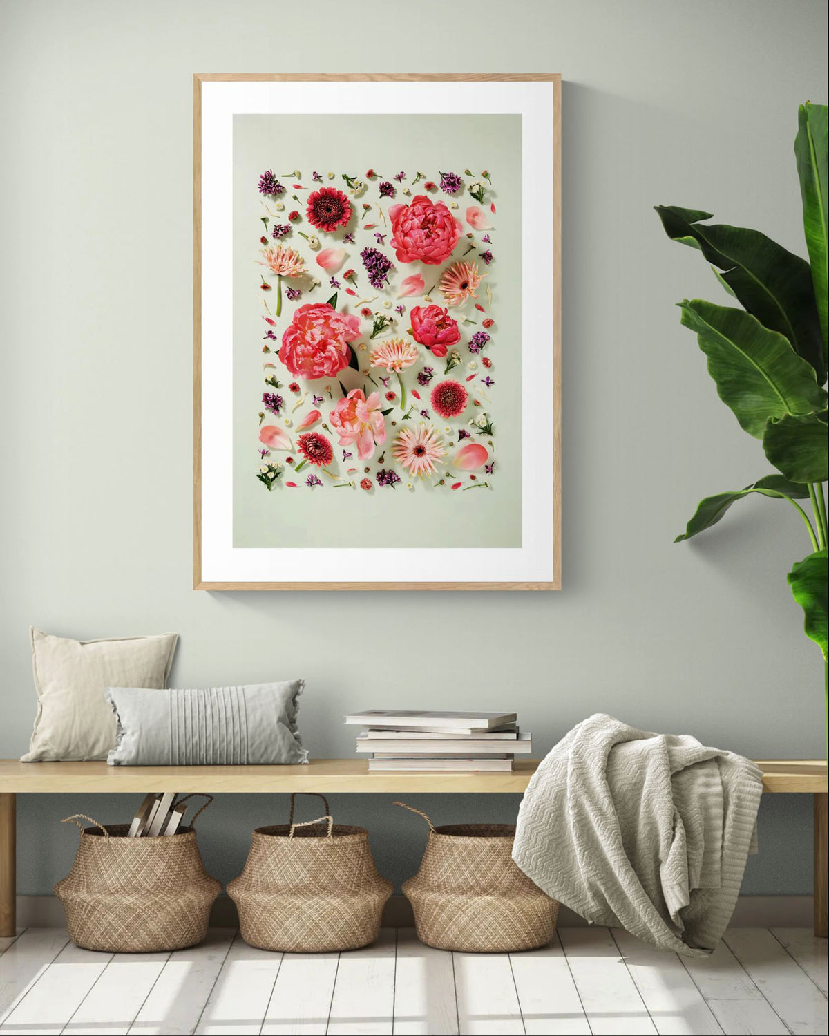Giving Grace - fine art floral flatlay of peonies, gerberas and lilac on muted green on a hallway wall, from Quiet Emergence by Connie Chan.
