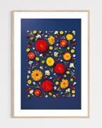 Unapologetic - fine art floral flatlay of red dahlias and gerberas on deep navy in a light wood frame, from Quiet Emergence by Connie Chan.